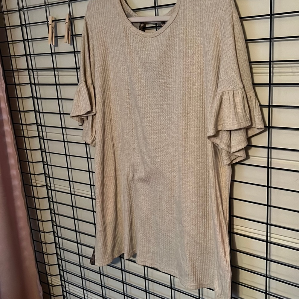 3x, top, back detail